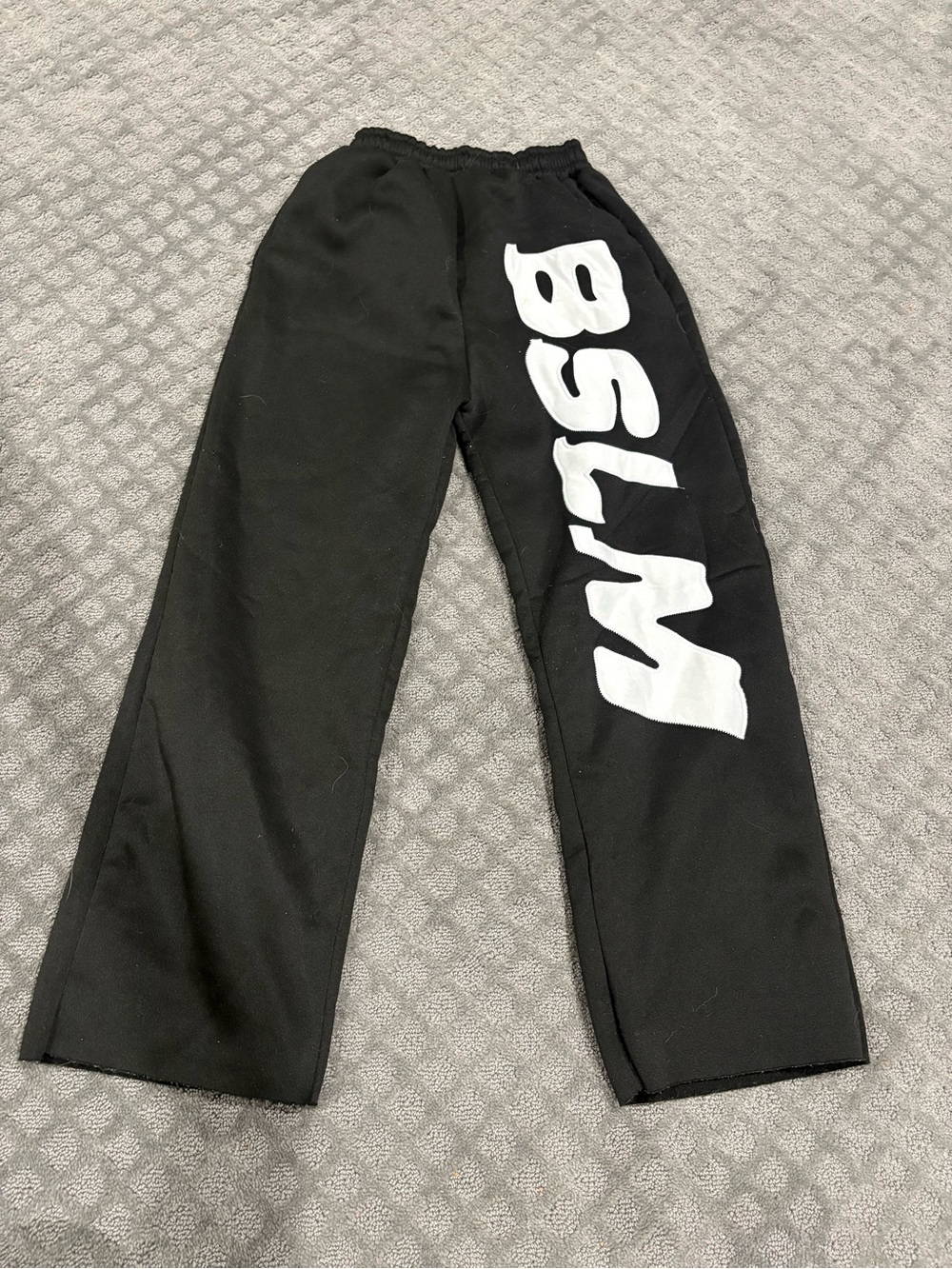 Black Graphic Sweatpants with White Lettering